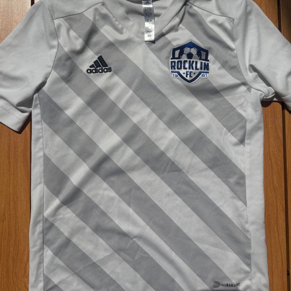 Adidas boys M Rocklin FC gray and white diagonal striped soccer jersey